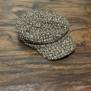 Brown and tan newsboy cap with silver thread woven in
